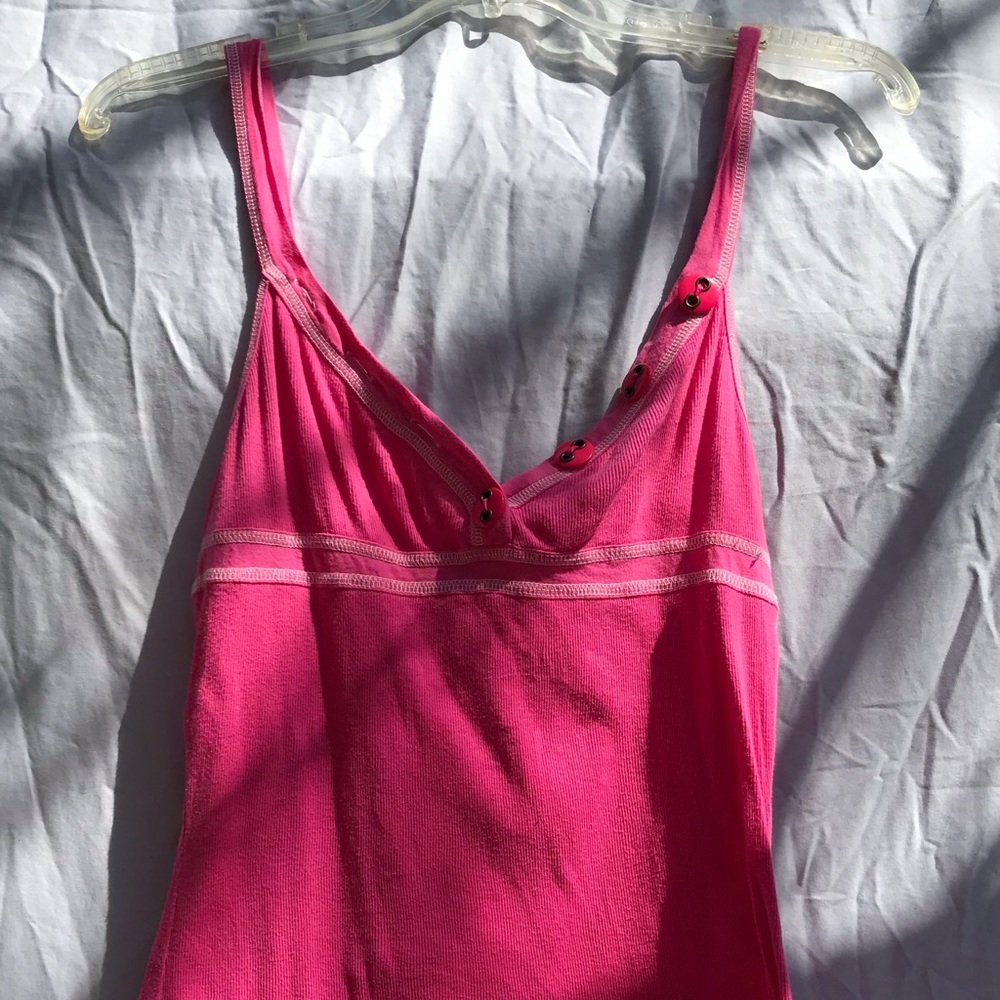 Pink Roxy Tank with button detailing.